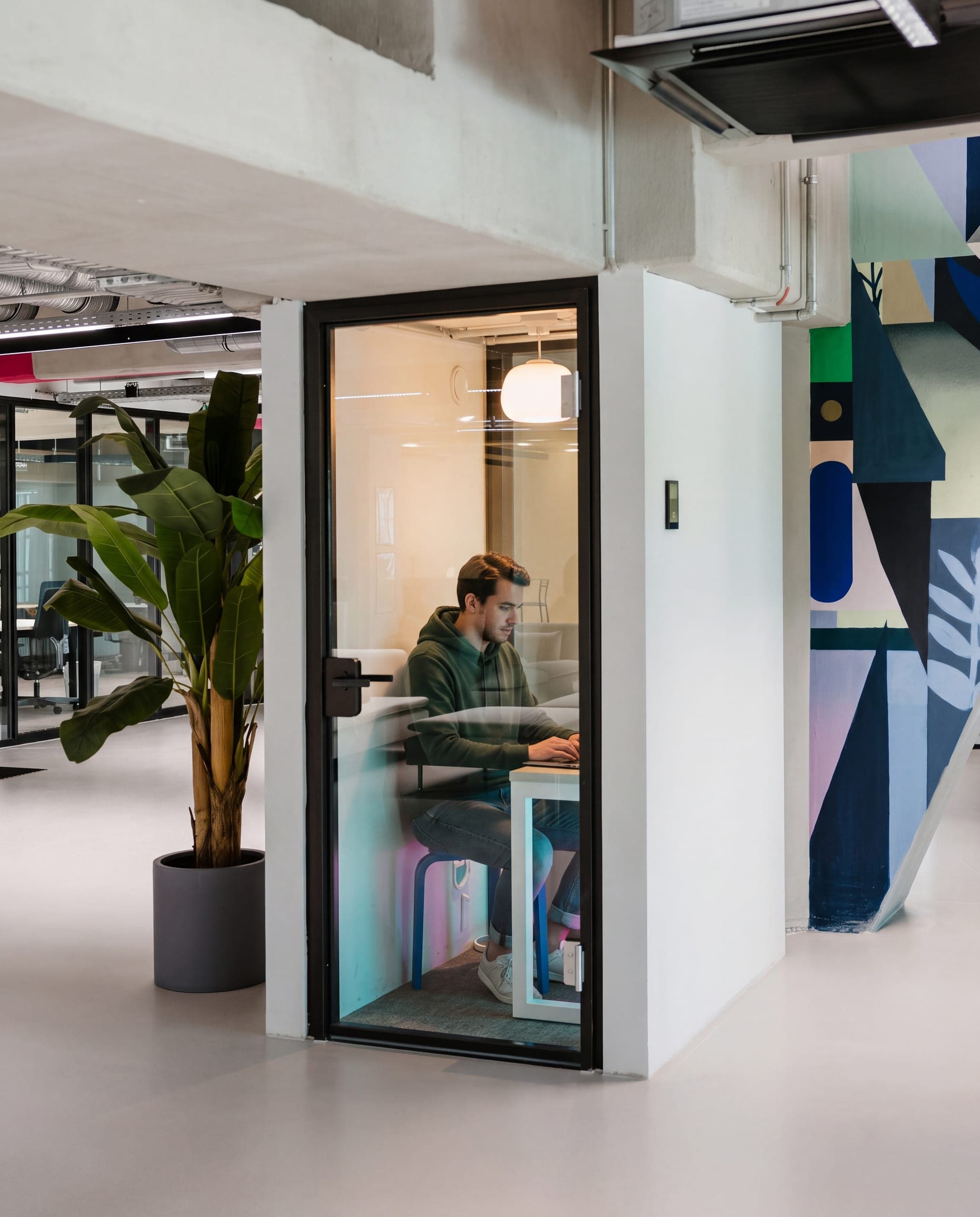 A phone booth for taking calls away from the desks