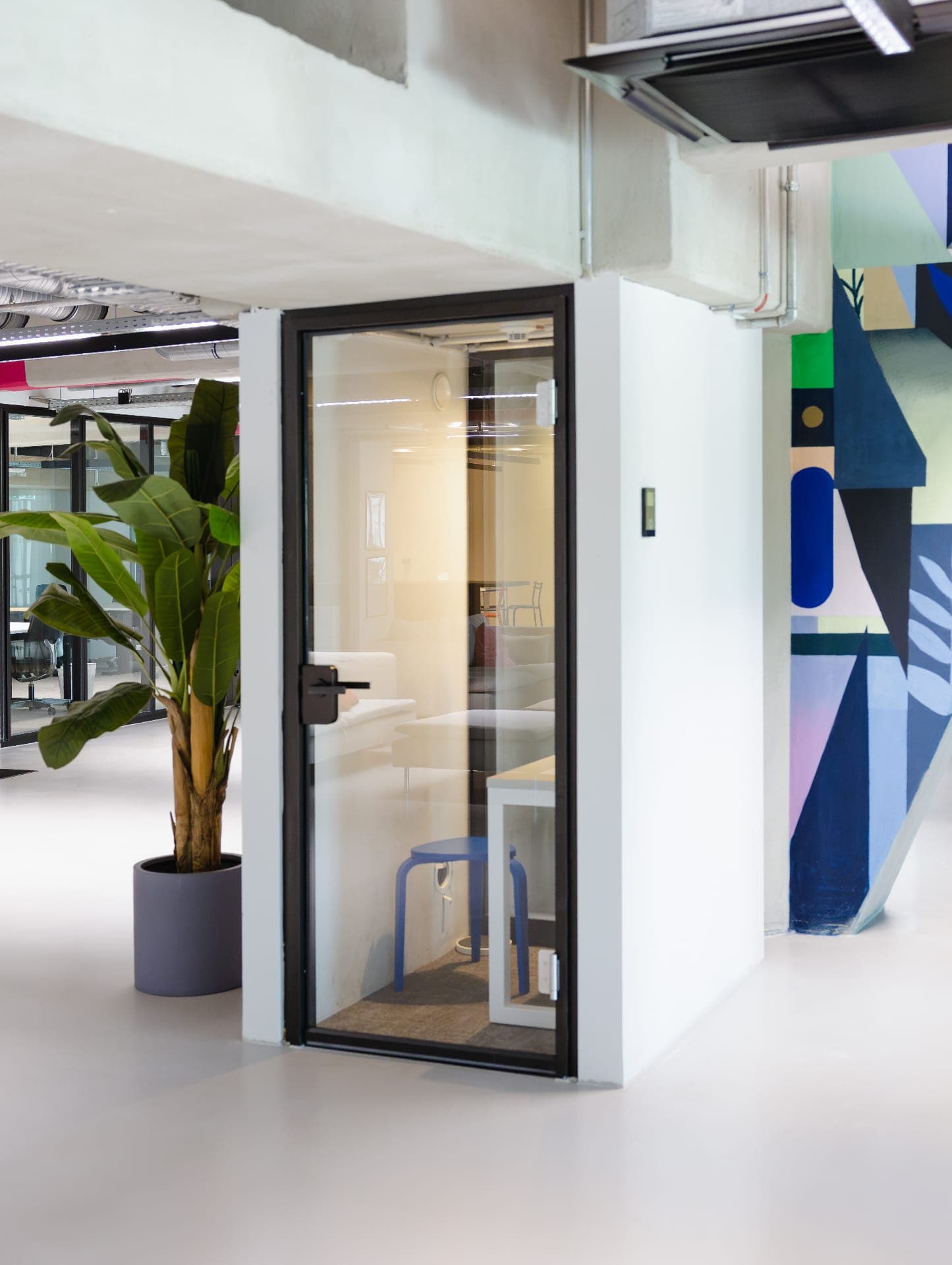 A phone booth for taking calls away from the desks