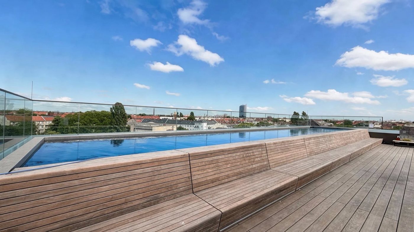 The Rooftop pool deck with Berlin on the horizon