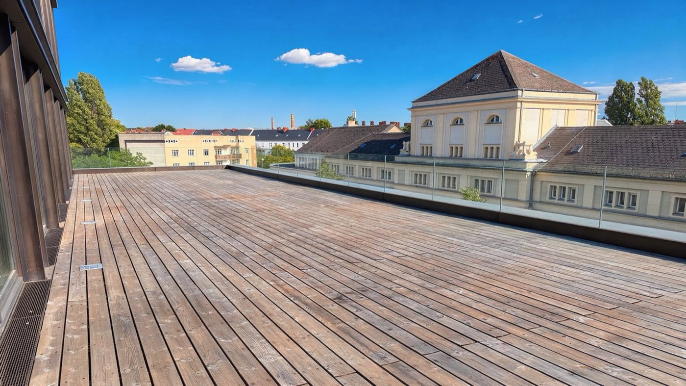 The Terrace's open-air deck on a clear day, overlooking Berlin